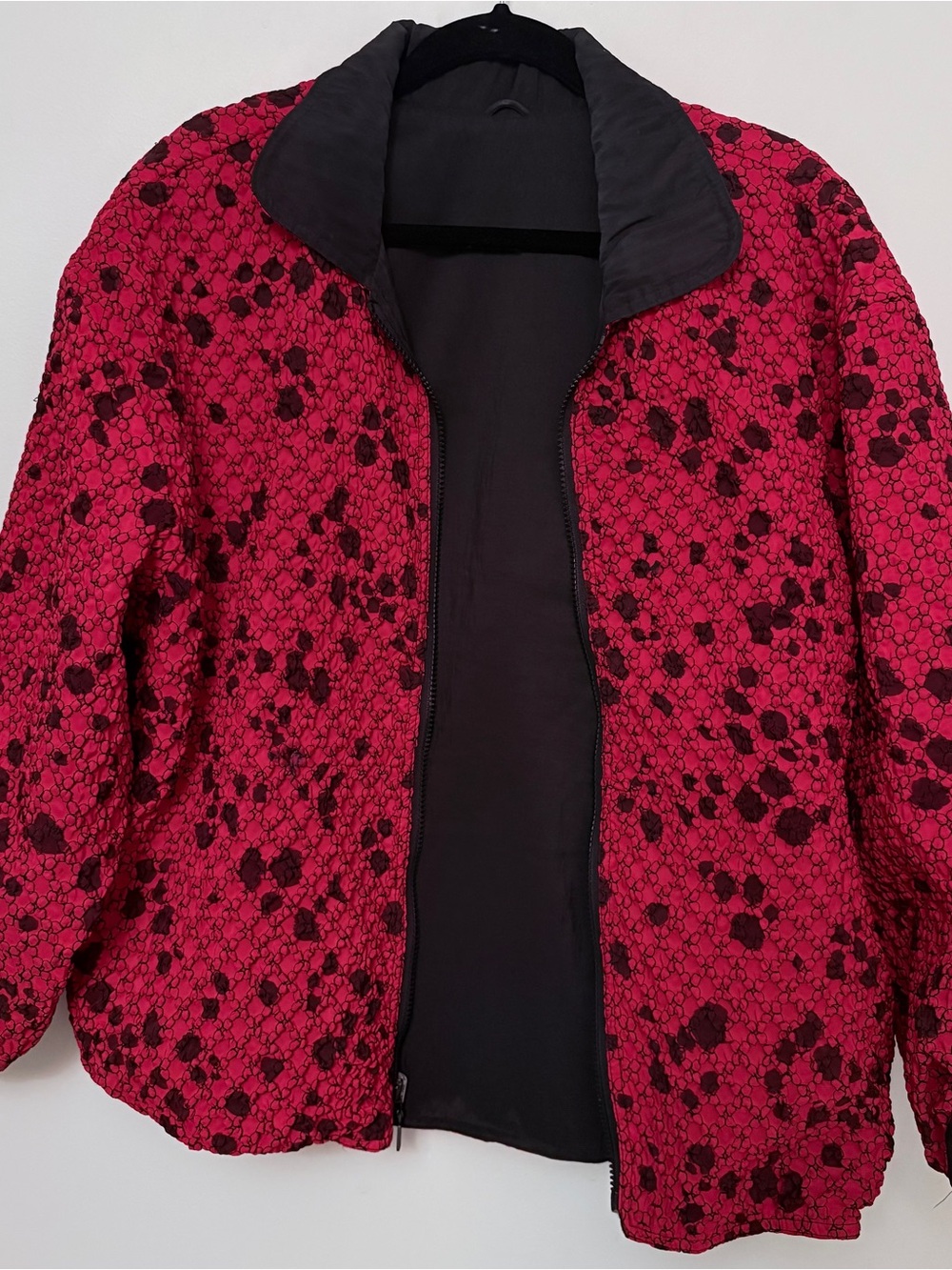 Mycra Pac Reversible Red Jacket with Black Pattern